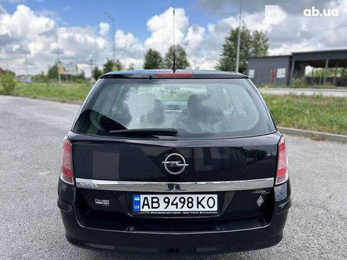 Opel Astra 2009 - фото 14