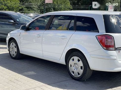 Opel Astra 2010 - фото 23