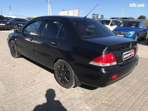 Mitsubishi Lancer 2008 черный - фото 13
