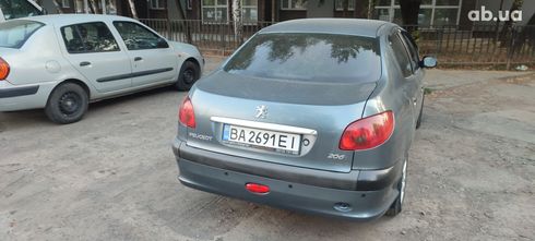 Peugeot 206 2007 серый - фото 5