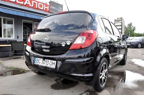 Opel Corsa 2008 - фото 7