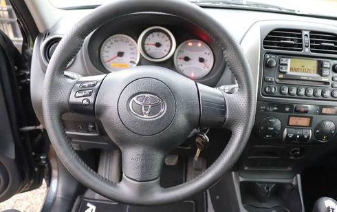 Toyota RAV4 2004 серый - фото 4