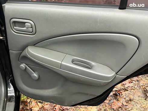 Nissan Almera 2008 черный - фото 74