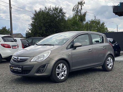 Opel Corsa 2011 - фото 8