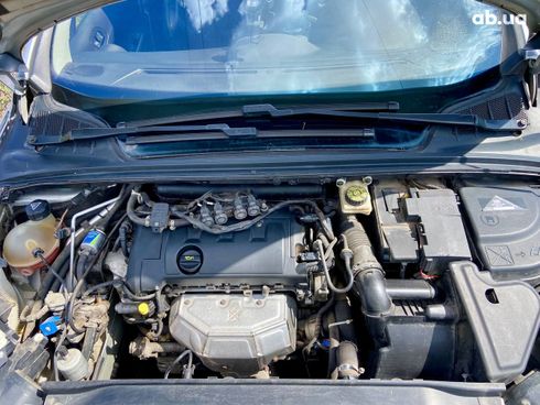 Peugeot 308 2011 серебристый - фото 12