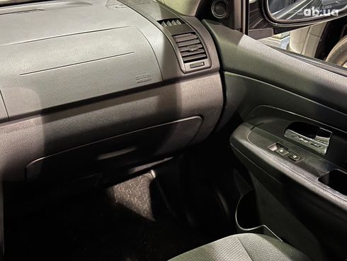 SsangYong Rexton 2010 черный - фото 17