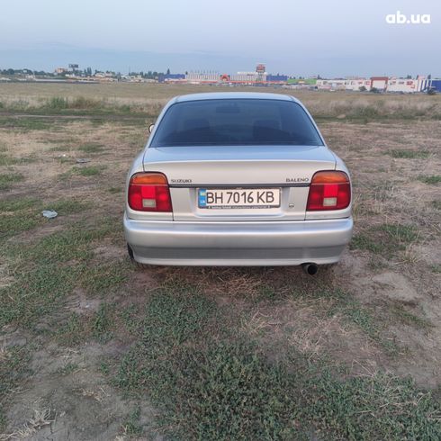 Suzuki Baleno 1995 серебристый - фото 8