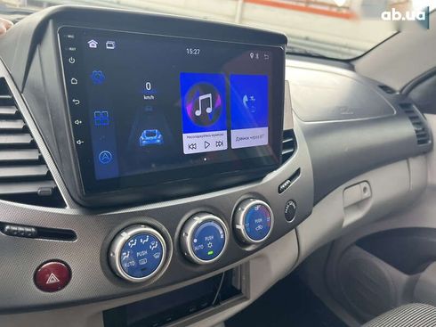 Mitsubishi l 200 2008 - фото 18