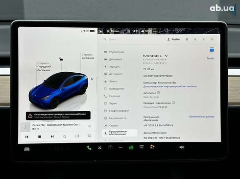 Tesla Model Y 2023 - фото 18