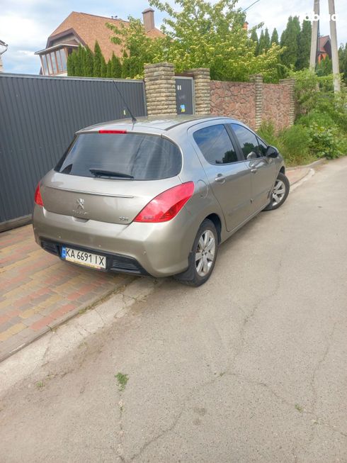 Peugeot 308 2011 золотистый - фото 3