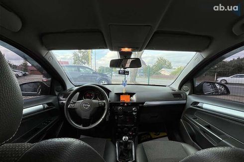 Opel Astra 2010 - фото 22