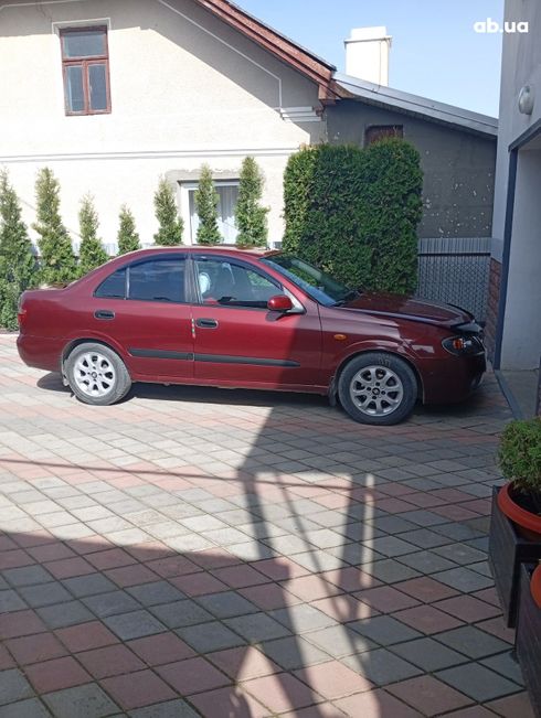 Nissan Almera 2004 вишневый - фото 14