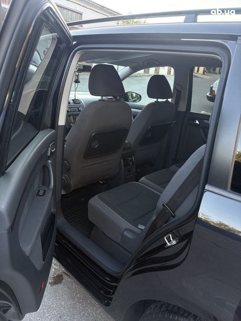 Volkswagen Touran 2010 черный - фото 8