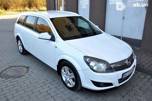 Opel Astra 2010 - фото 12