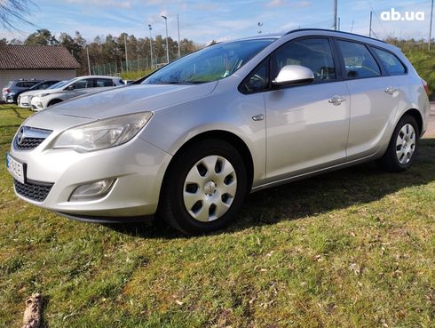 Opel Astra J 2011 серебристый - фото 14