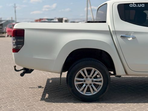 Mitsubishi l 200 2019 белый - фото 10