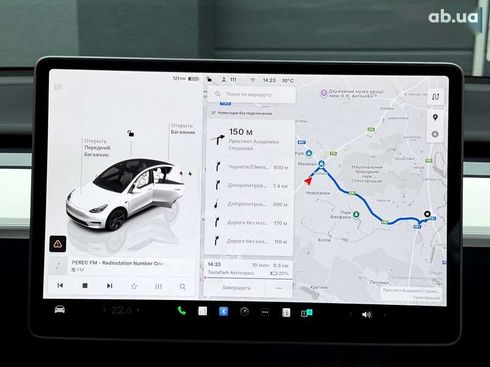 Tesla Model Y 2024 - фото 24