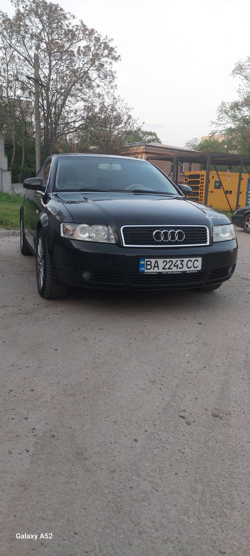 Audi A4 2003 черный - фото 7