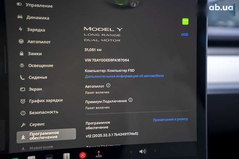 Tesla Model Y 2023 - фото 29