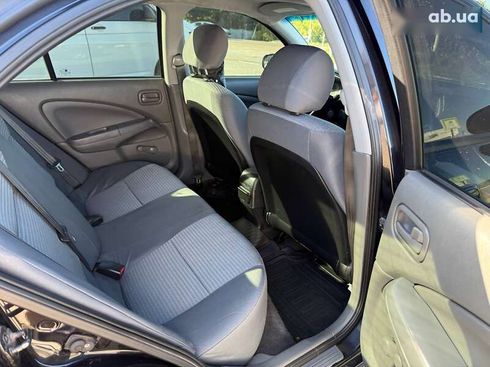 Nissan Almera 2012 - фото 12