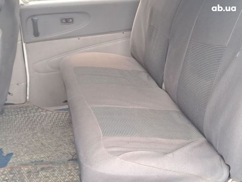 Mitsubishi L 400 2000 белый - фото 6