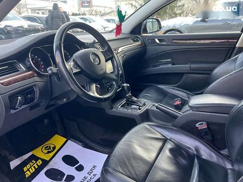 Skoda Superb 2014 - фото 11