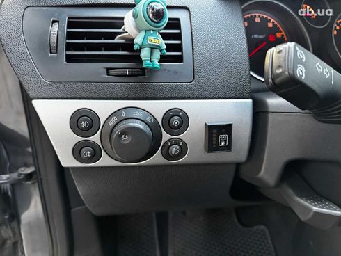 Opel Astra 2010 серый - фото 13