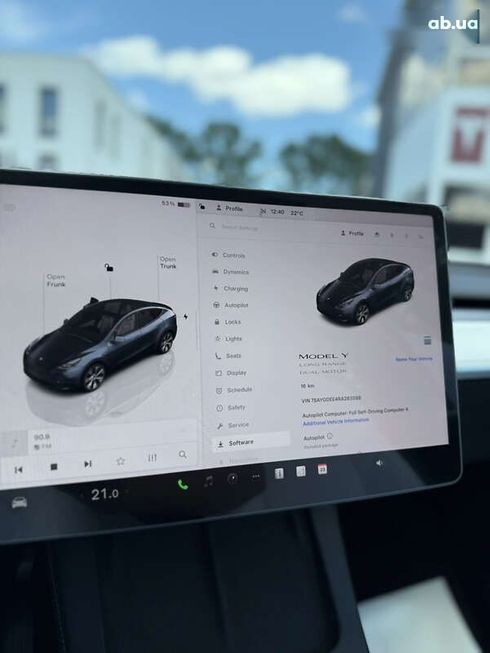 Tesla Model Y 2024 - фото 28