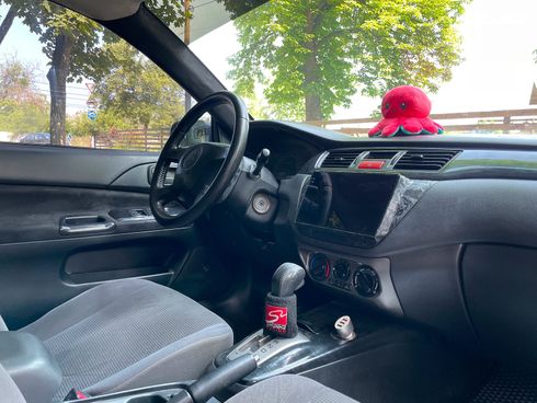 Mitsubishi Lancer 2003 черный - фото 27