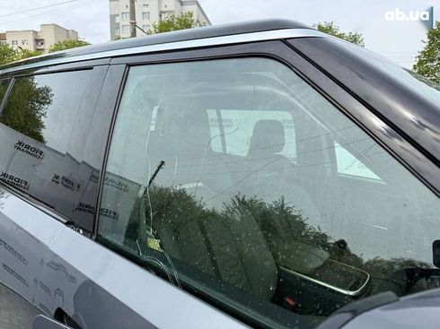 Rivian R1S 2023 - фото 16