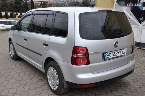 Volkswagen Touran 2010 - фото 11