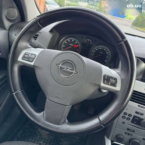 Opel Astra 2009 - фото 10