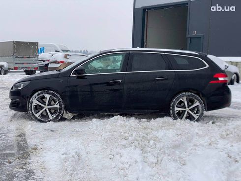 Peugeot 308 2015 черный - фото 8
