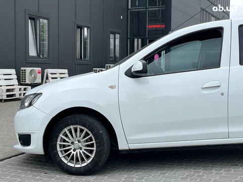 Dacia Logan 2015 белый - фото 37
