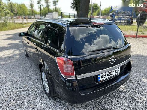 Opel Astra 2009 - фото 10