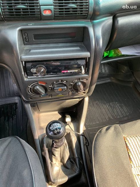 Opel Astra 1992 серый - фото 14