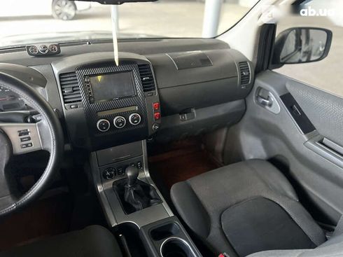 Nissan Navara 2010 - фото 25