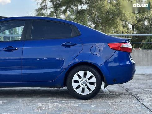 Kia Rio 2013 - фото 12
