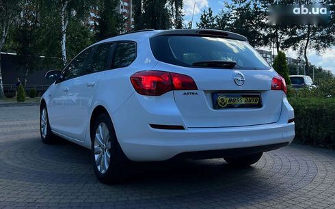 Opel Astra 2011 - фото 5
