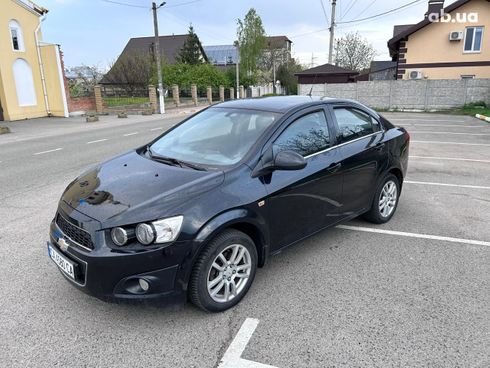 Chevrolet Aveo 2013 черный - фото 2