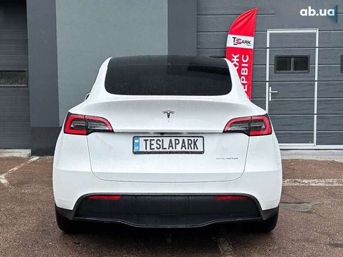 Tesla Model Y 2024 - фото 9