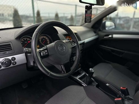 Opel Astra 2010 - фото 20