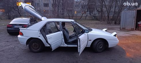 Mazda 323 1990 белый - фото 8
