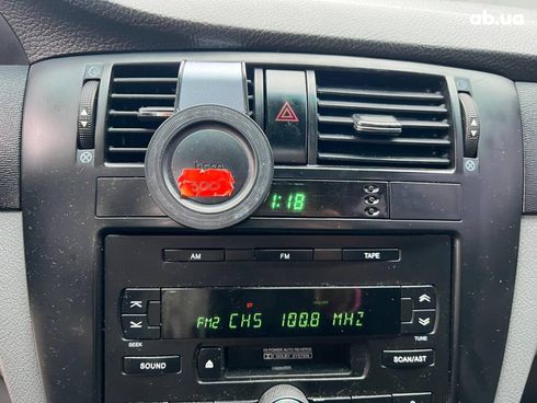 Chevrolet Lacetti 2006 черный - фото 26