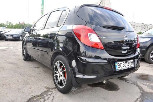 Opel Corsa 2008 - фото 11