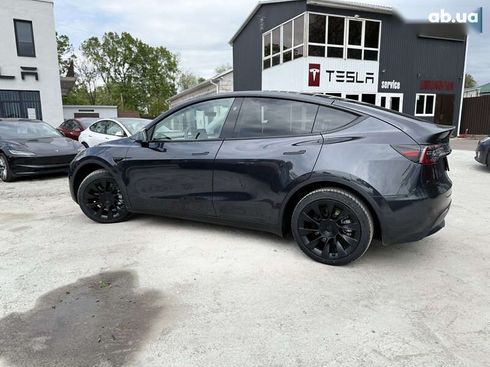 Tesla Model Y 2024 - фото 14