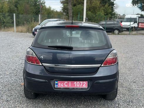 Opel Astra 2008 - фото 17