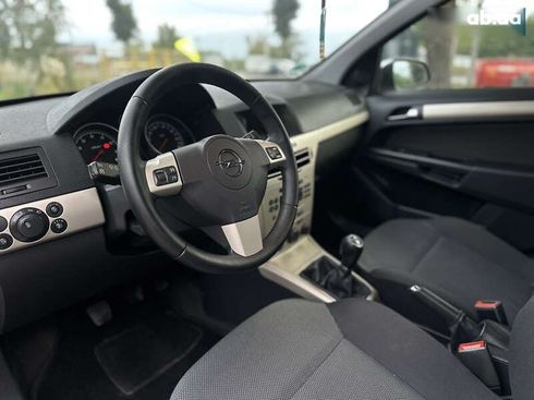 Opel Astra 2008 - фото 30
