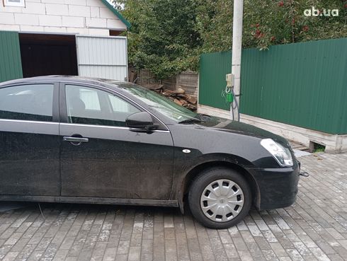 Nissan Almera 2016 - фото 2