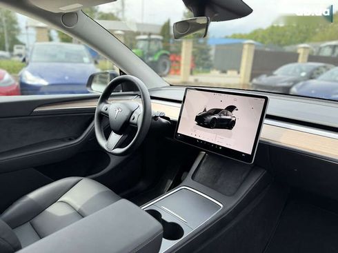 Tesla Model Y 2024 - фото 30
